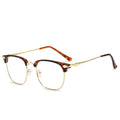 Gafas vintage con montura cuadrada y medio borde